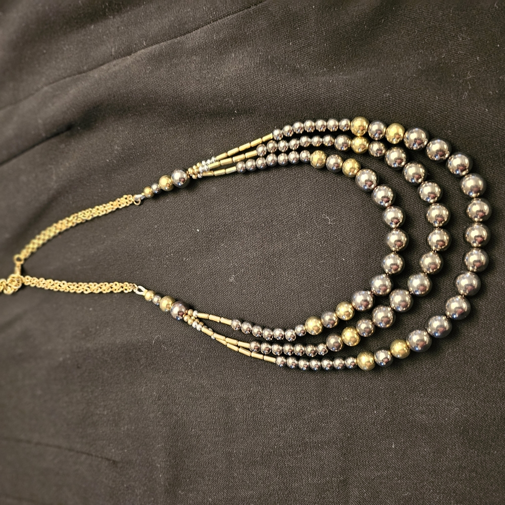Elegant Gold and Silver Beaded Necklace